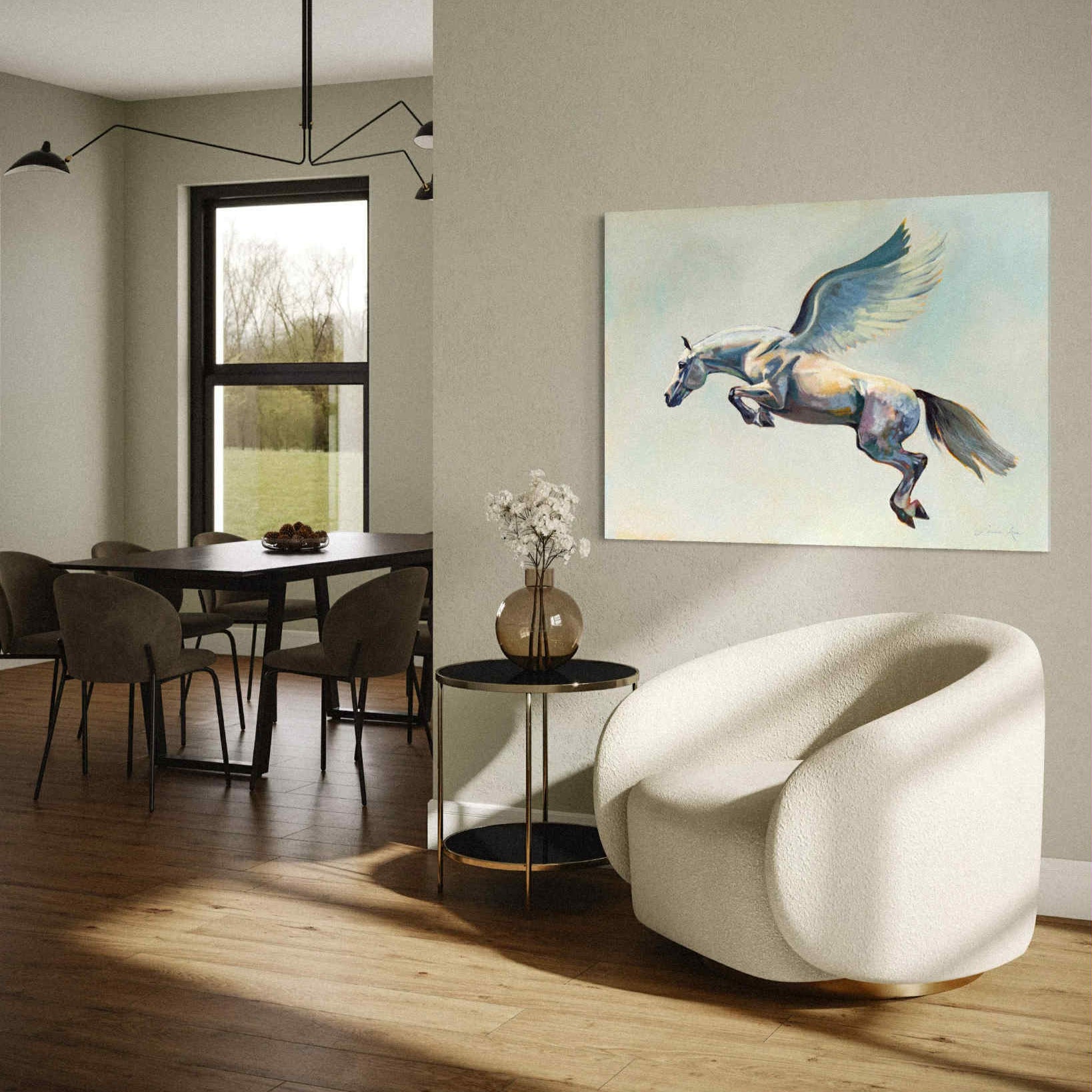 Modern interior with a white armchair, dining table, and original Pegasus winged horse artwork on the wall.